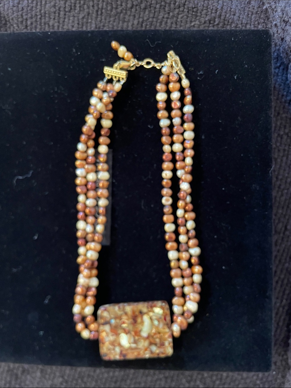 Multistrand Brown and Cream Bead Necklace with Marbled Pendant